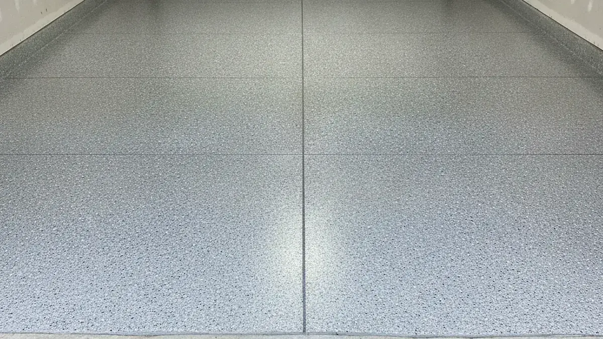 Illustrative garage floor coating surface used to explain preparation and finish choices for Ardmore homeowners